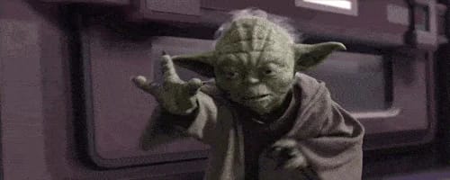 Yoda pointant vers l'avant dans un vaisseau spatial.